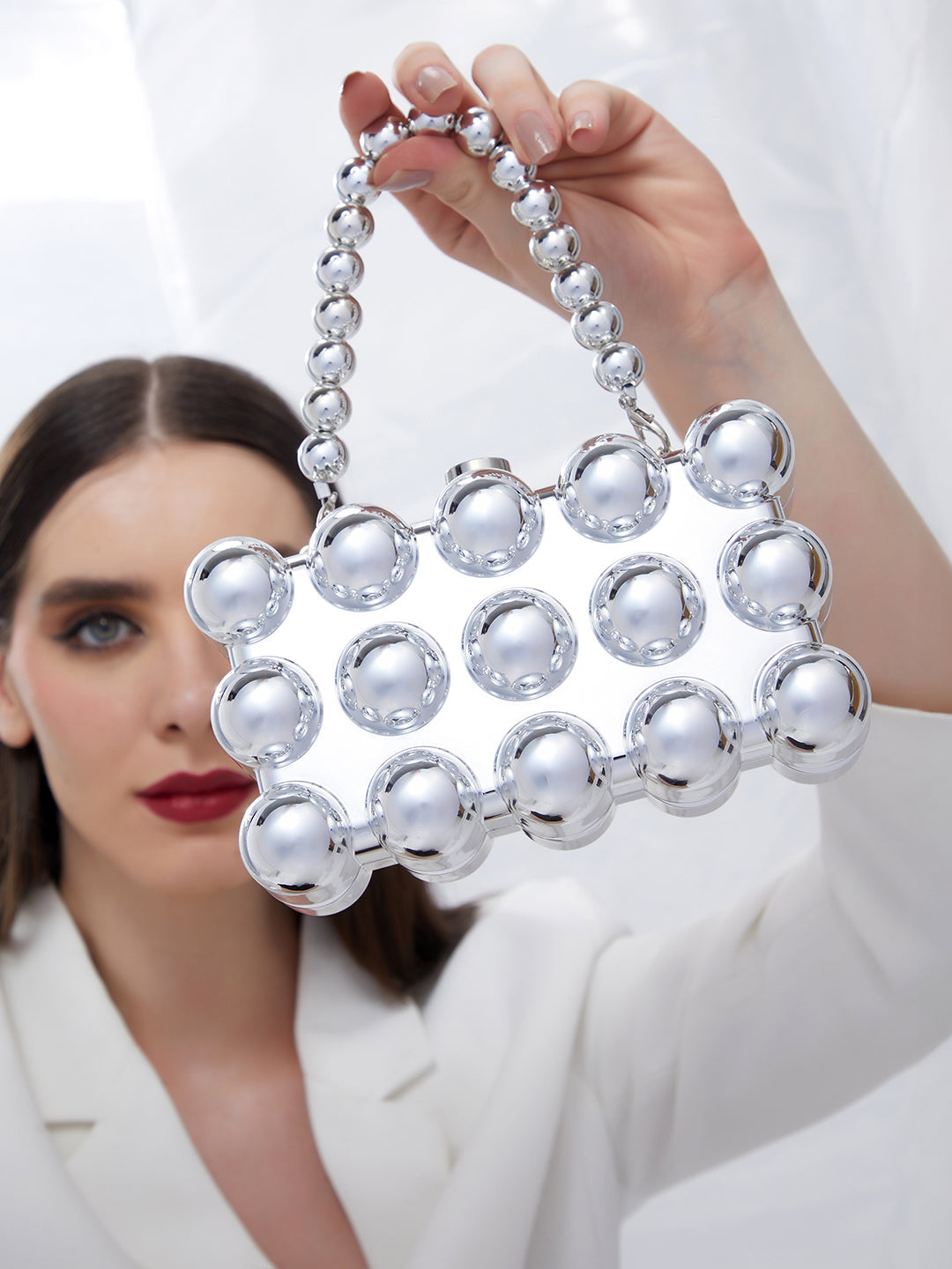 The Ball-Ball Clutch Bag - Metallic Silver